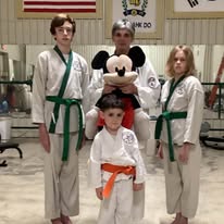 Carthage Karate students with instructor — kids and adults training together